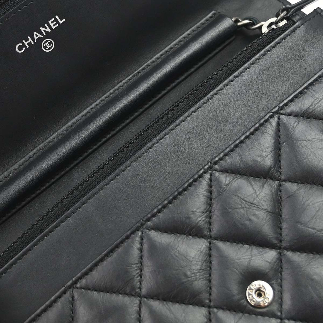 Chanel 2.55 Reissue WOC in Pelle di Vitello Invecchiata Nero Vintage