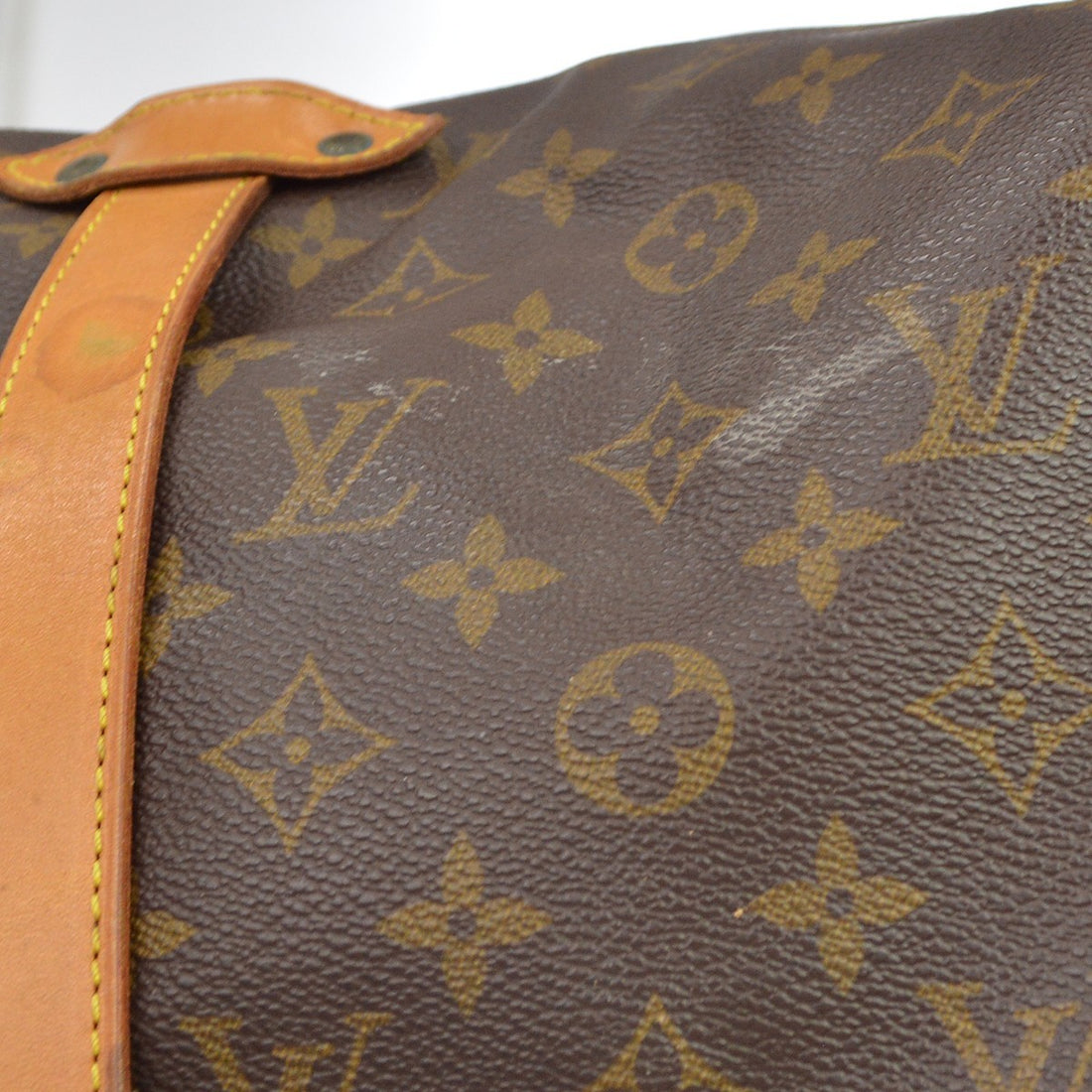Louis Vuitton Saumur 35 in Tela Monogram Marrone Vintage