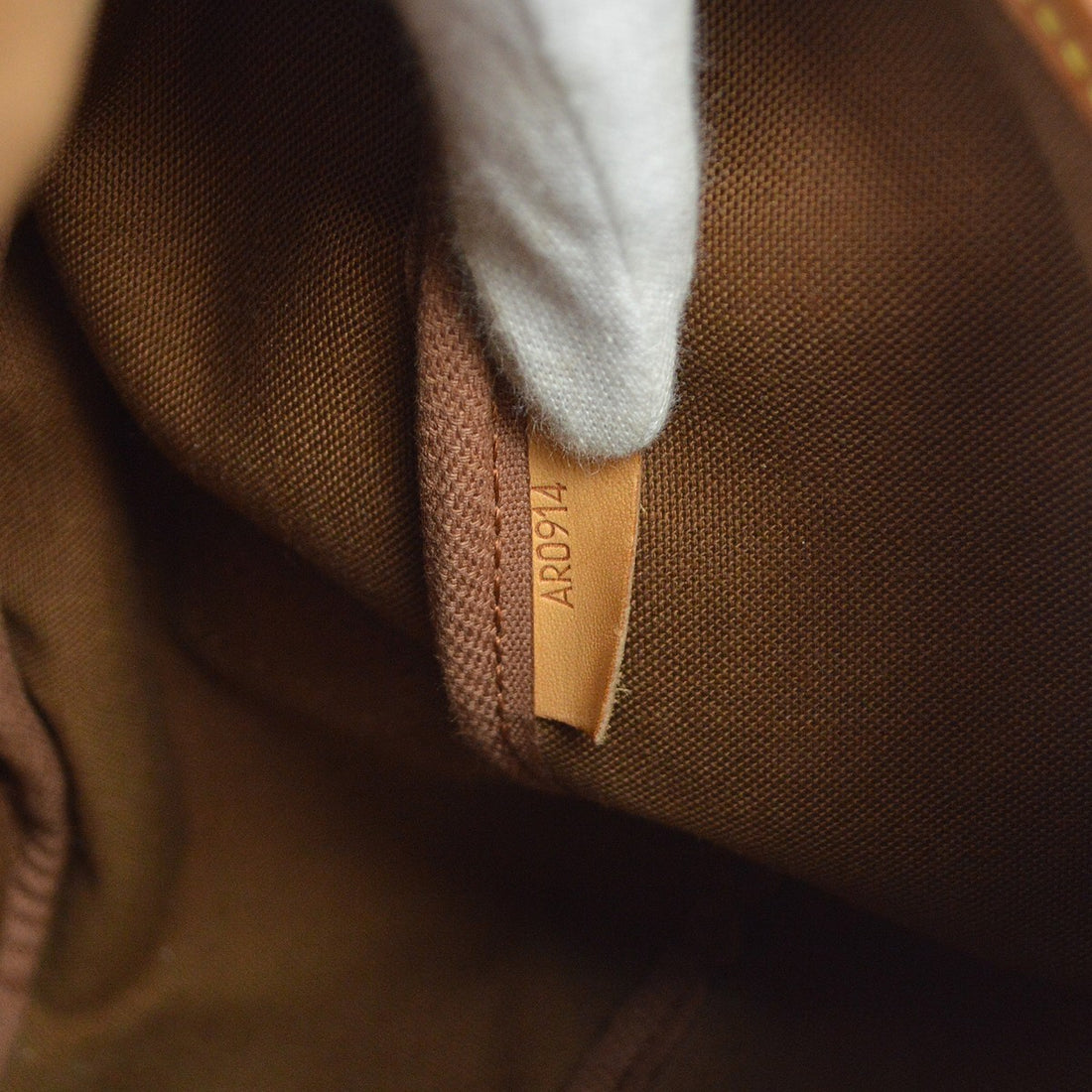 Louis Vuitton Saumur 35 in Tela Monogram Marrone Vintage