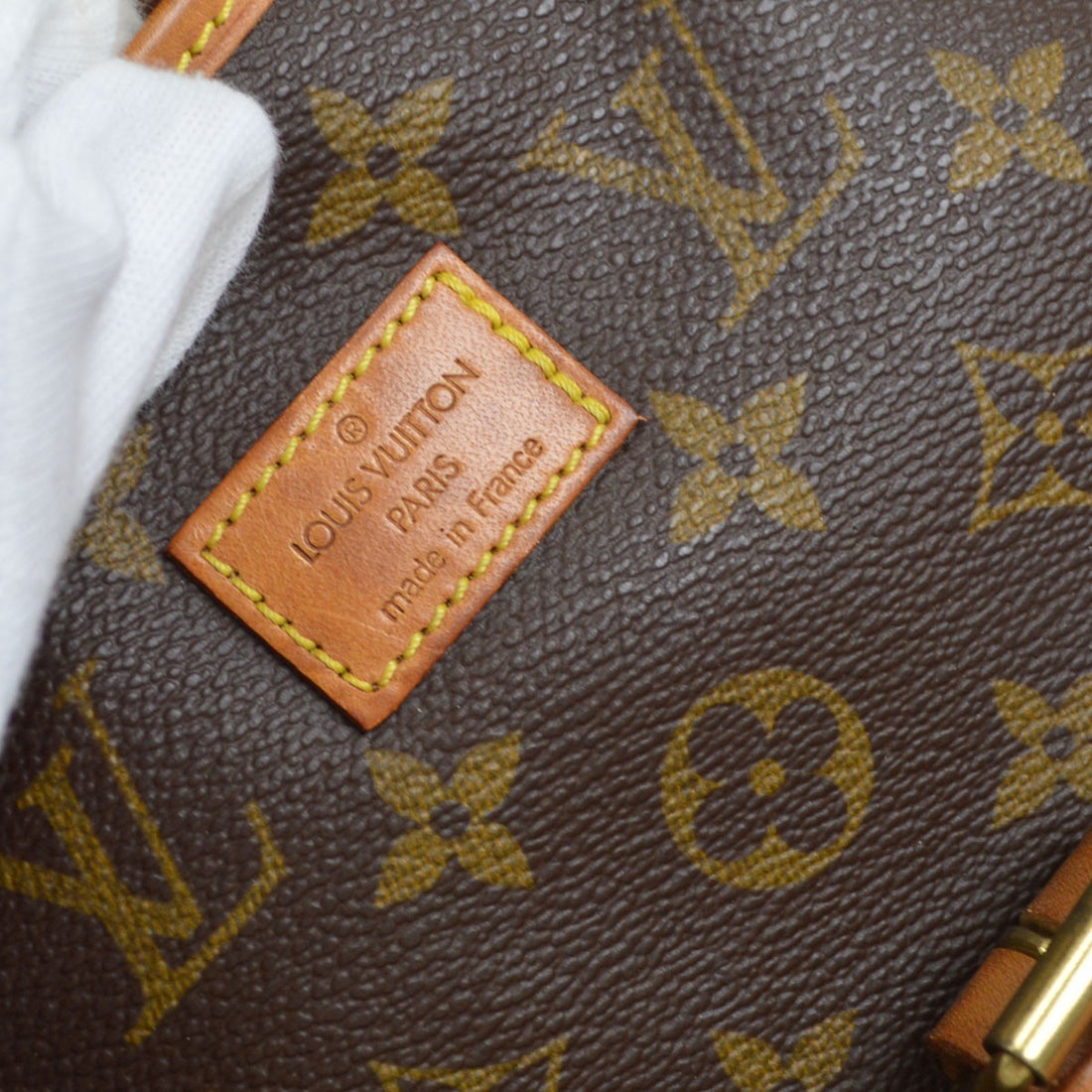 Louis Vuitton Saumur 35 in Tela Monogram Marrone Vintage