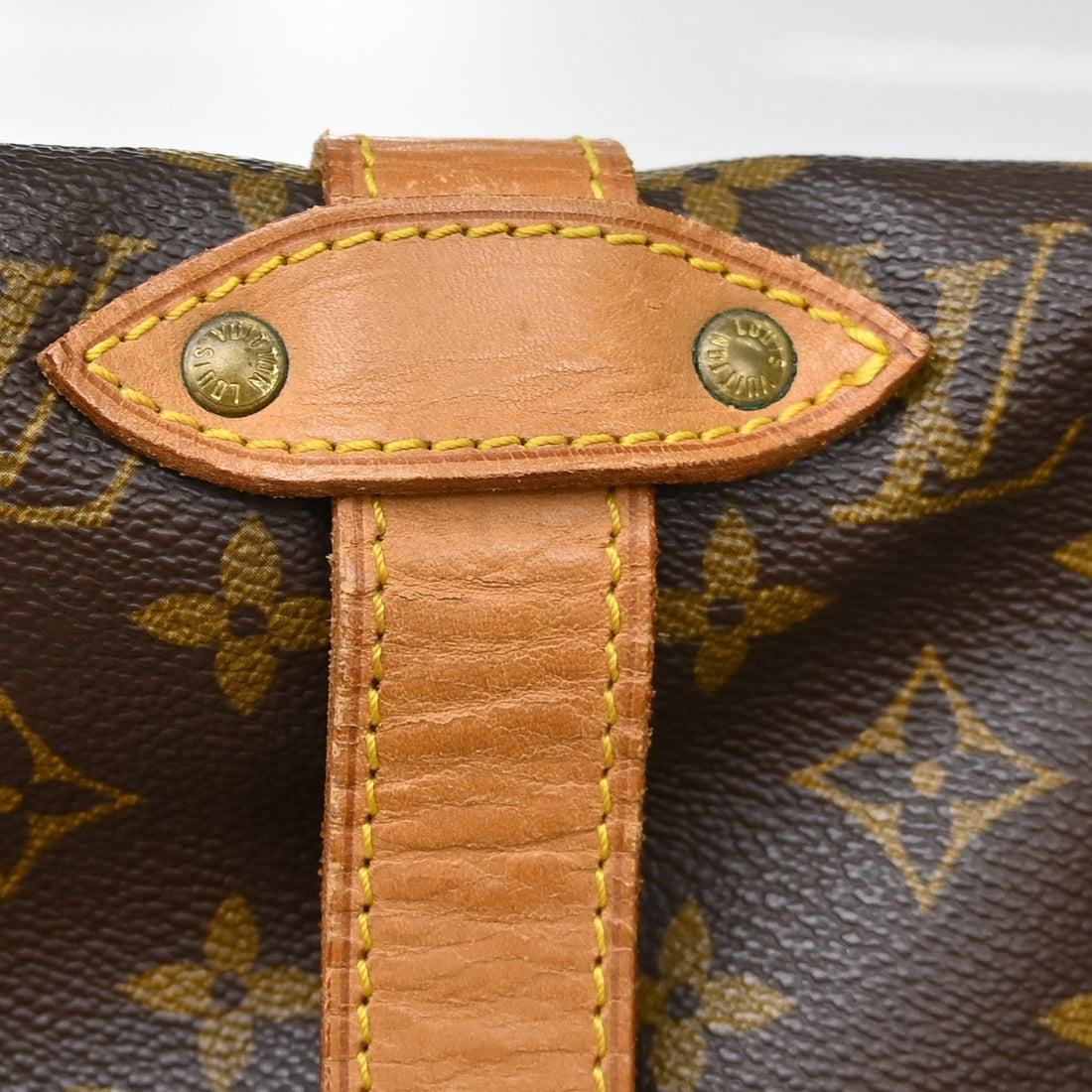 Louis Vuitton Saumur 35 in Tela Monogram Marrone Vintage