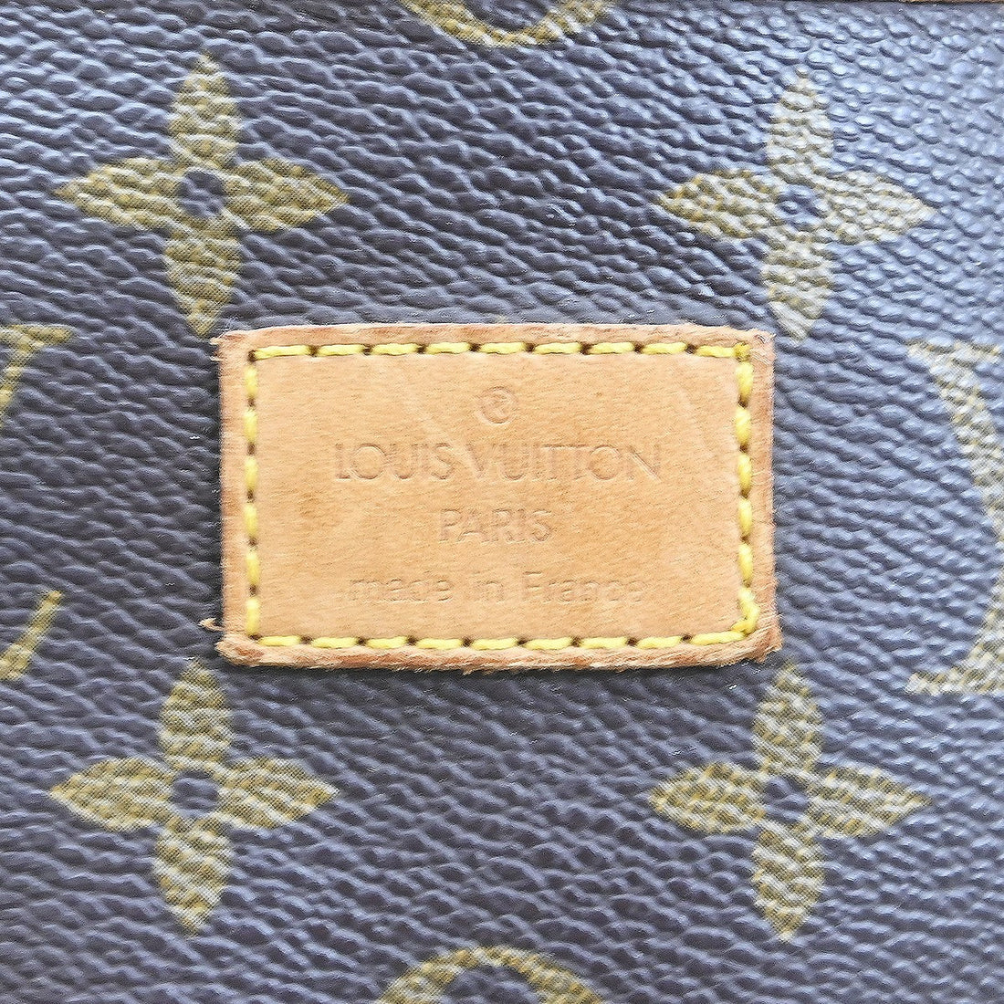 Louis Vuitton Saumur 35 in Tela Monogram Marrone Vintage