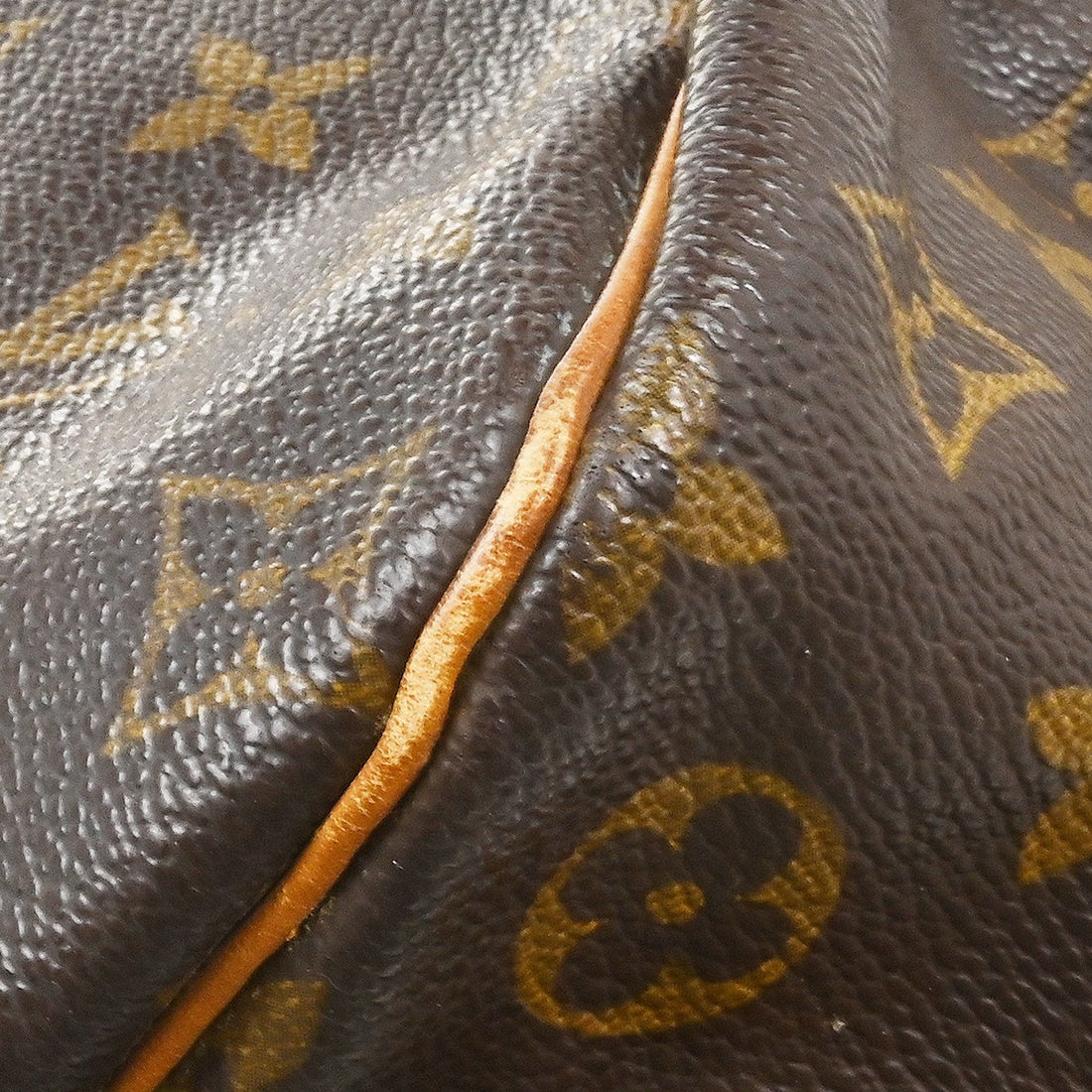 Louis Vuitton Saumur 35 in Tela Monogram Marrone Vintage