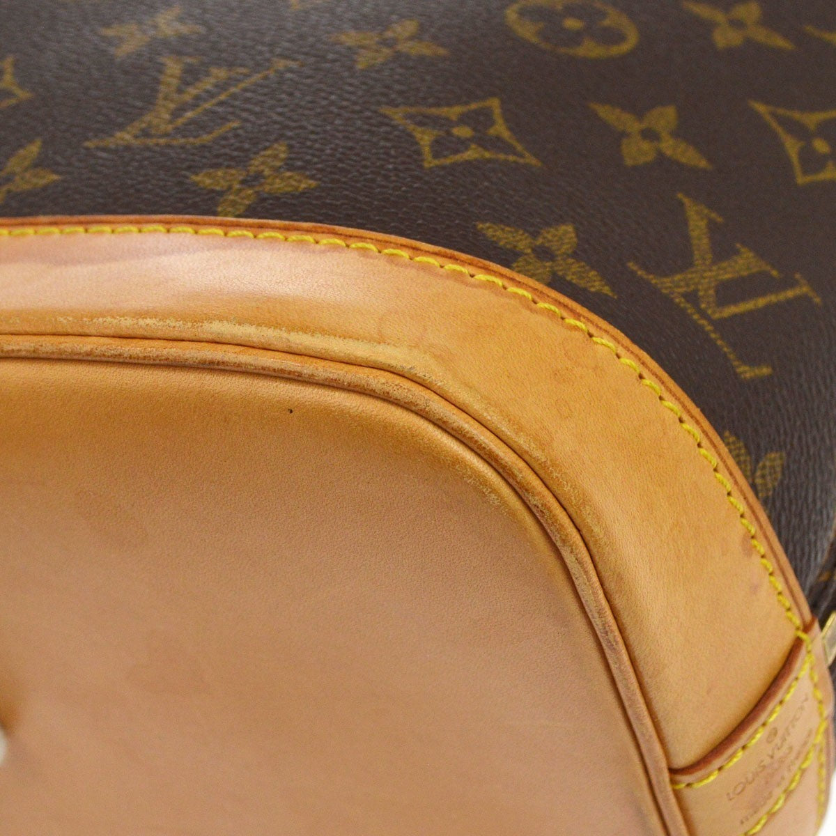 Louis Vuitton Alma Vintage in Tela